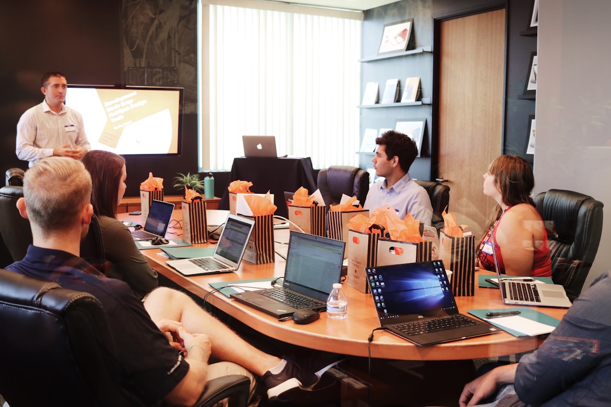 C-suite executives discussing AI strategy in a boardroom setting